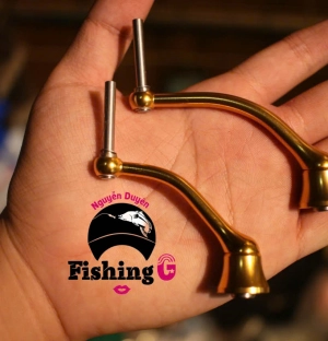 Tay quay vàng  độ máy câu FREAMS , EXCELER ( đời cũ )  núm mạt chược , núm nựa ABS