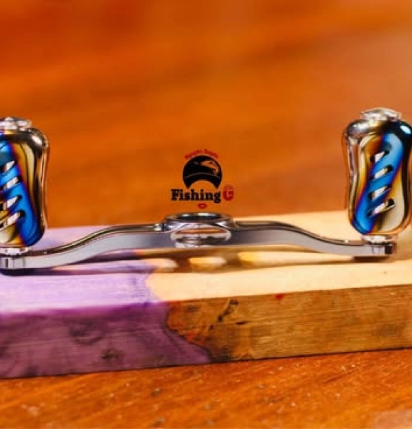 tay quay 100mm núm titan gắn máy câu cá 