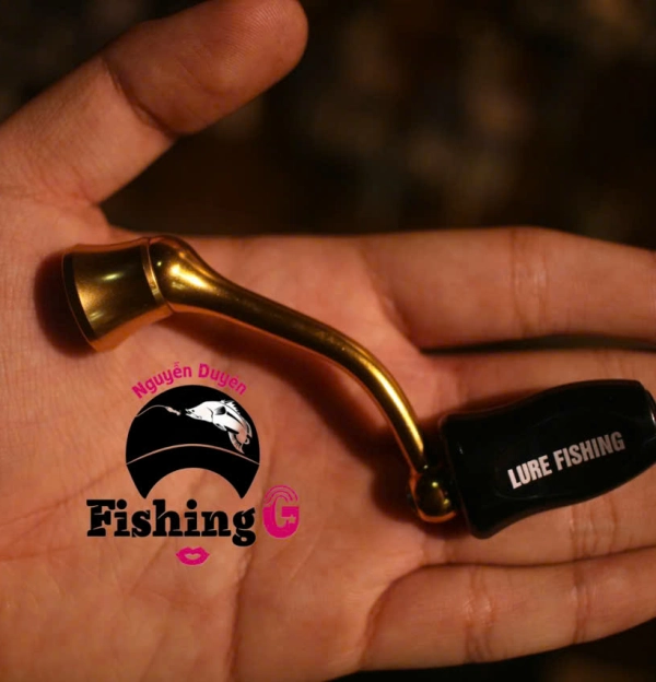Tay quay vàng  độ máy câu FREAMS , EXCELER ( đời cũ )  núm mạt chược , núm nựa ABS